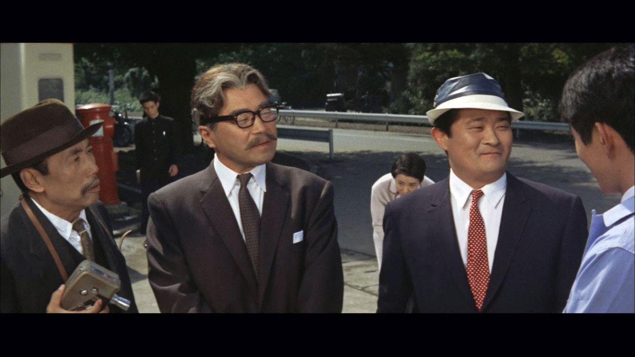 A Comedy in Front of the Station: University backdrop