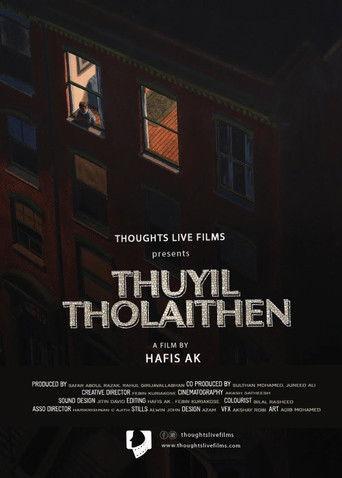Thuyil Tholaithen film afişi