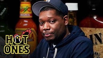 Michael Che Gs Up While Eating Spicy Wings